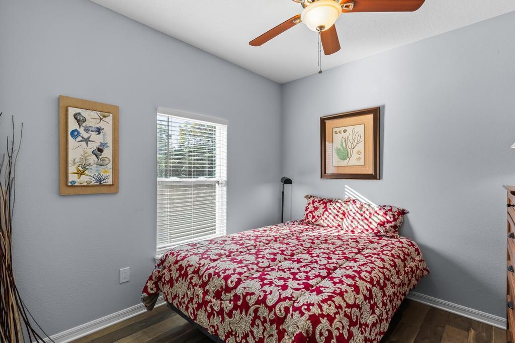 124 Dory Road St. Augustine, FL 32086 - Photo 24 of 39 a bedroom with bed and window