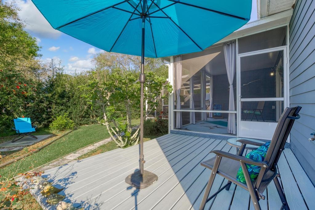 124 Dory Road St. Augustine, FL 32086 - Photo 31 of 39 a view of a deck with wooden floor and outdoor space