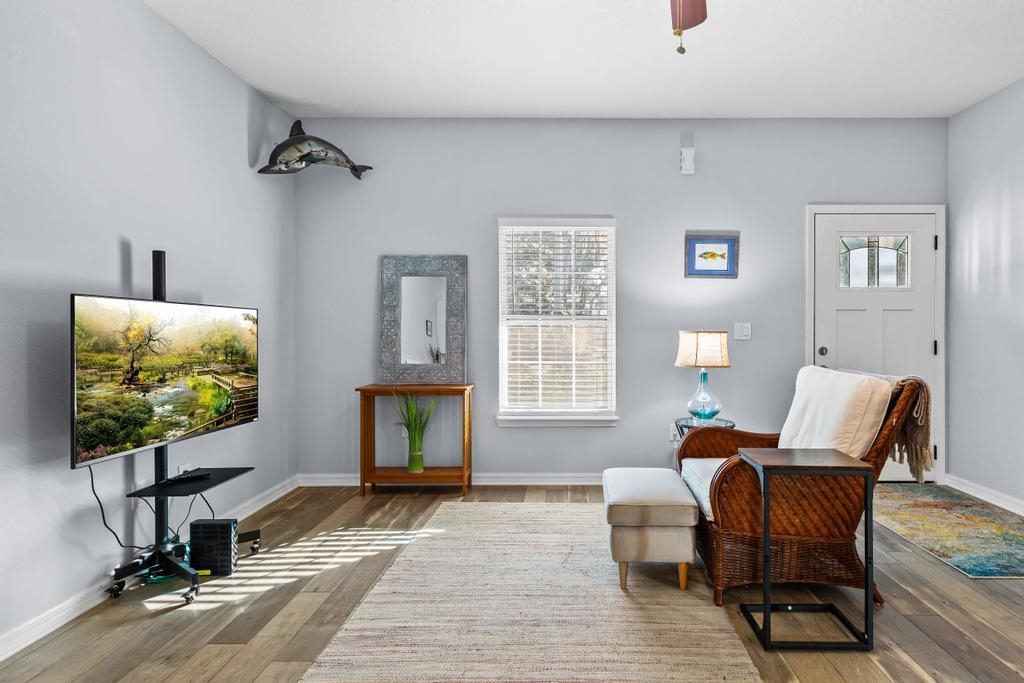 124 Dory Road St. Augustine, FL 32086 - Photo 6 of 39 a living room with furniture and a flat screen tv