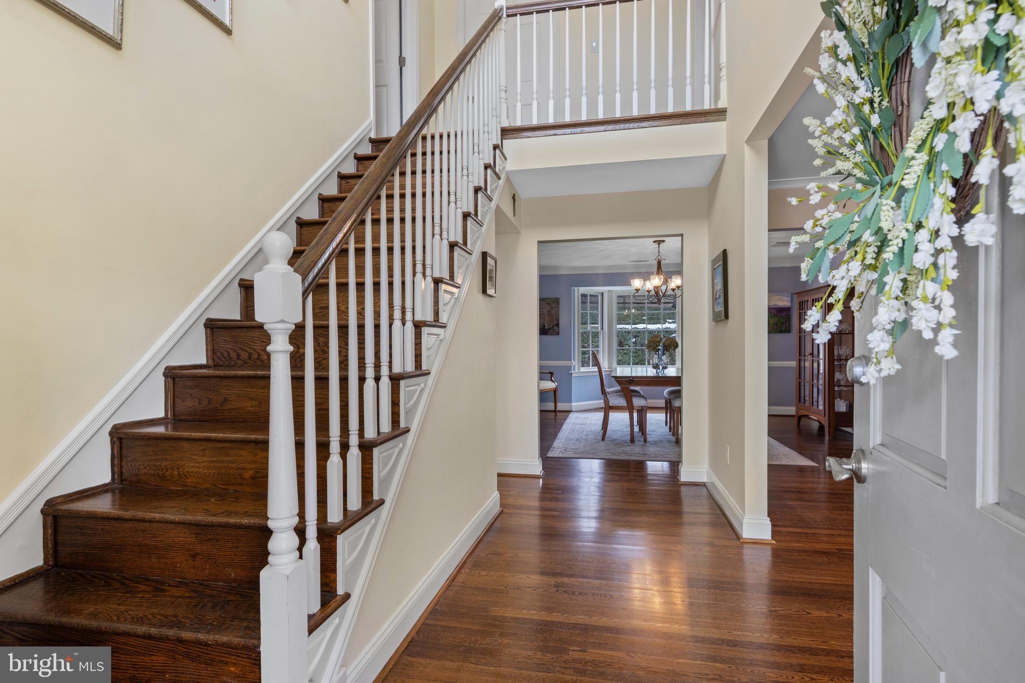 152 Hunters Lane Devon, PA 19333 - Photo 12 of 57 a view of staircase with lots of frames on wall and stairs
