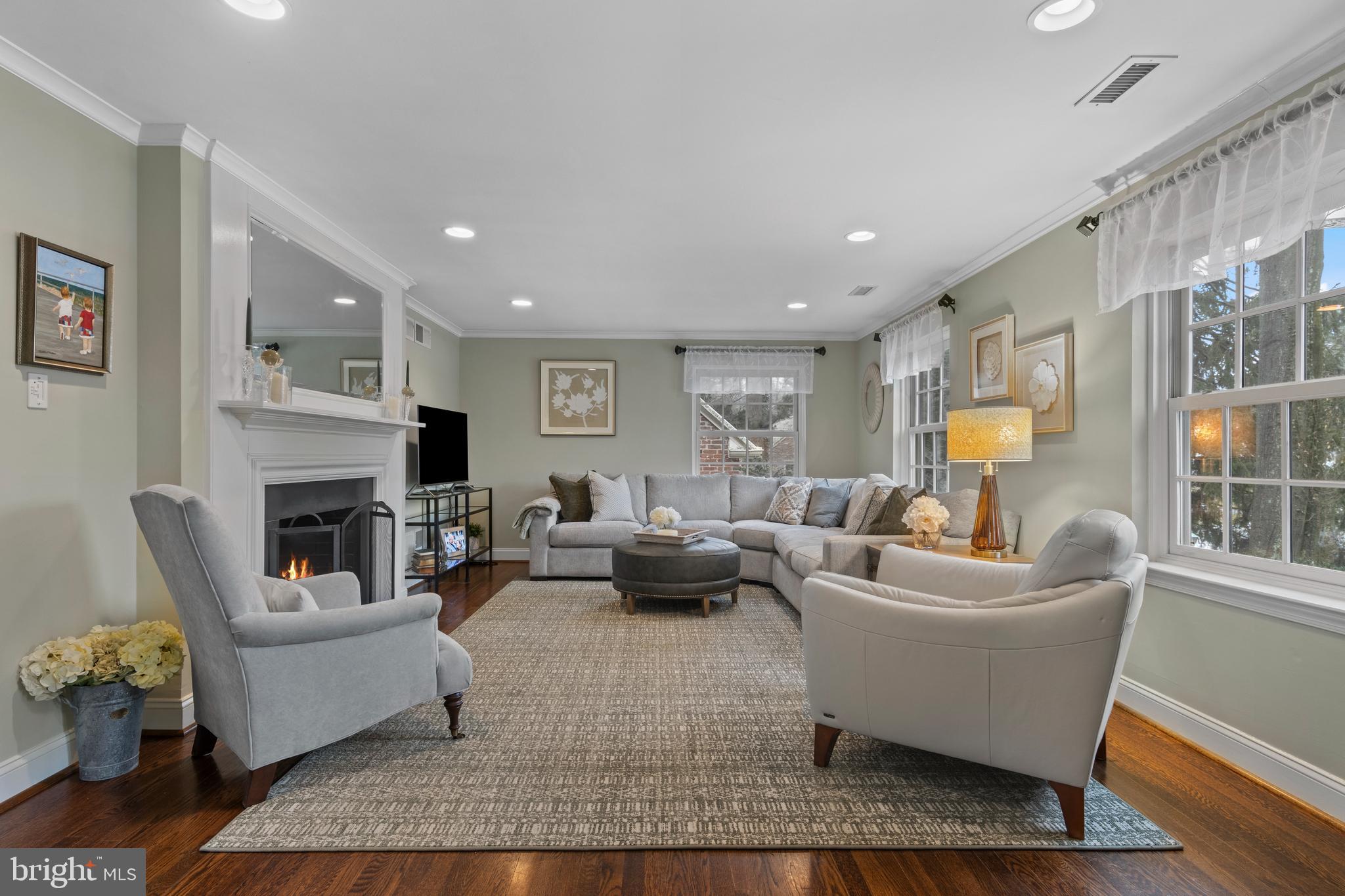 152 Hunters Lane Devon, PA 19333 - Photo 16 of 57 a living room with furniture wooden floor and a fireplace