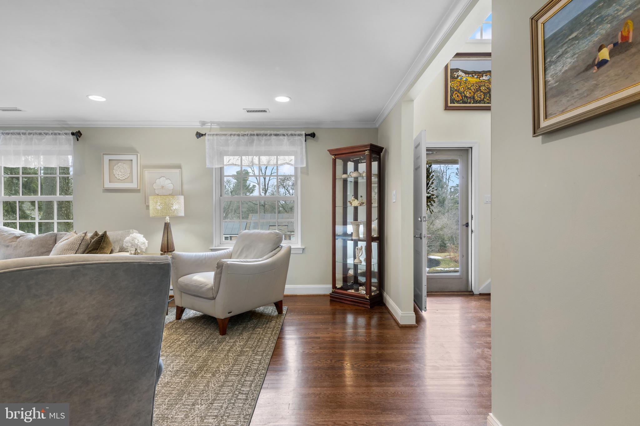 152 Hunters Lane Devon, PA 19333 - Photo 18 of 57 a living room with couches and painting on the wall