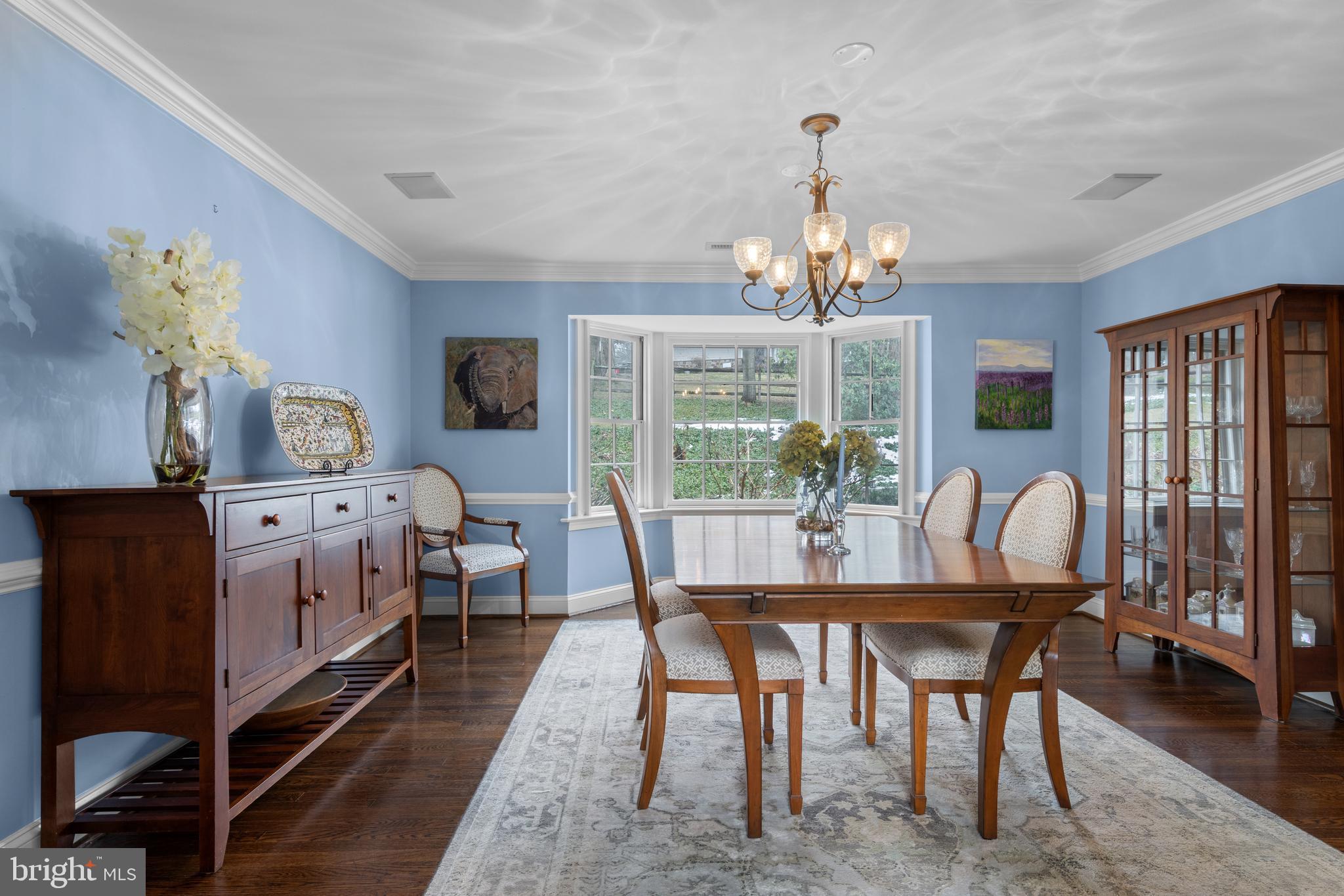 152 Hunters Lane Devon, PA 19333 - Photo 21 of 57 a dining room with furniture a chandelier and window