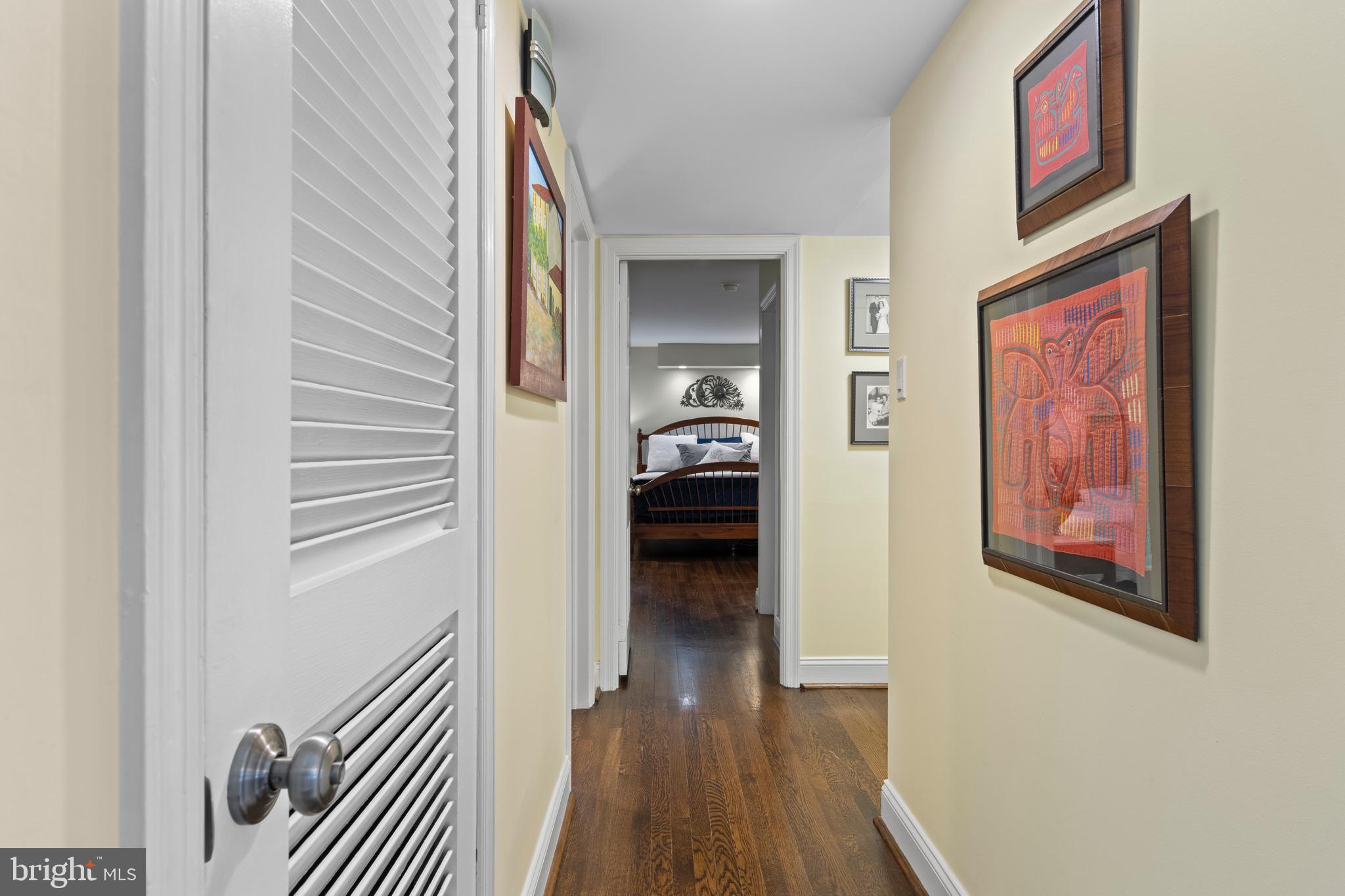 152 Hunters Lane Devon, PA 19333 - Photo 32 of 57 a view of a hallway view with wooden floor and staircase