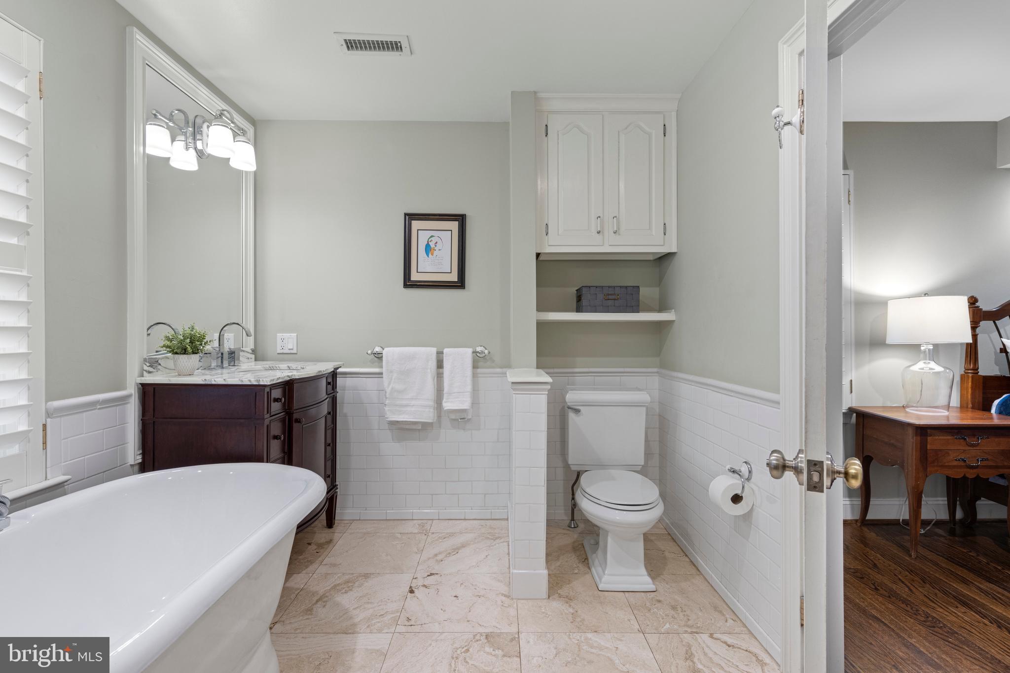 152 Hunters Lane Devon, PA 19333 - Photo 38 of 57 a spacious bathroom with a bathtub sink and toilet