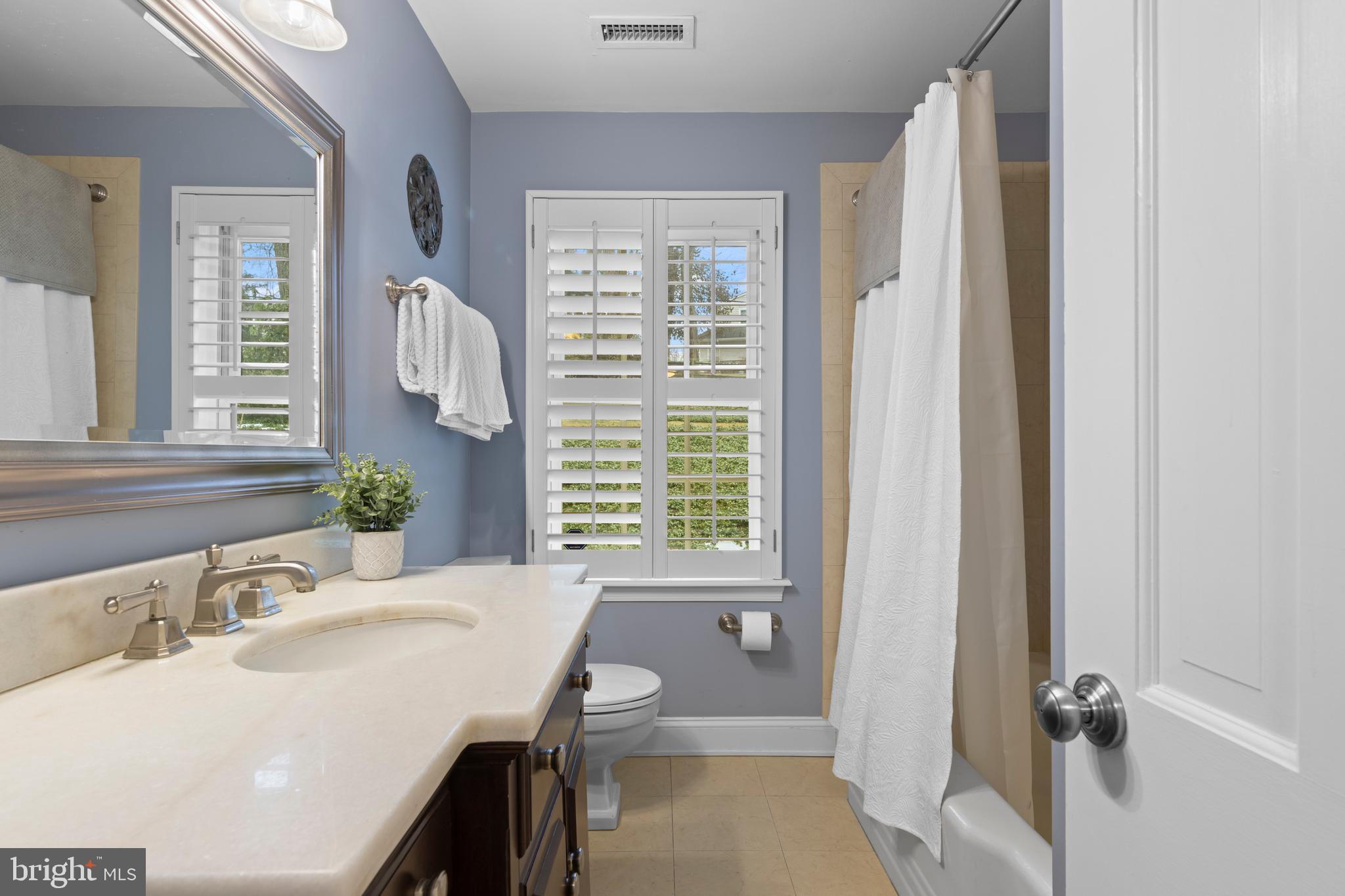 152 Hunters Lane Devon, PA 19333 - Photo 40 of 57 a bathroom with a sink and a mirror