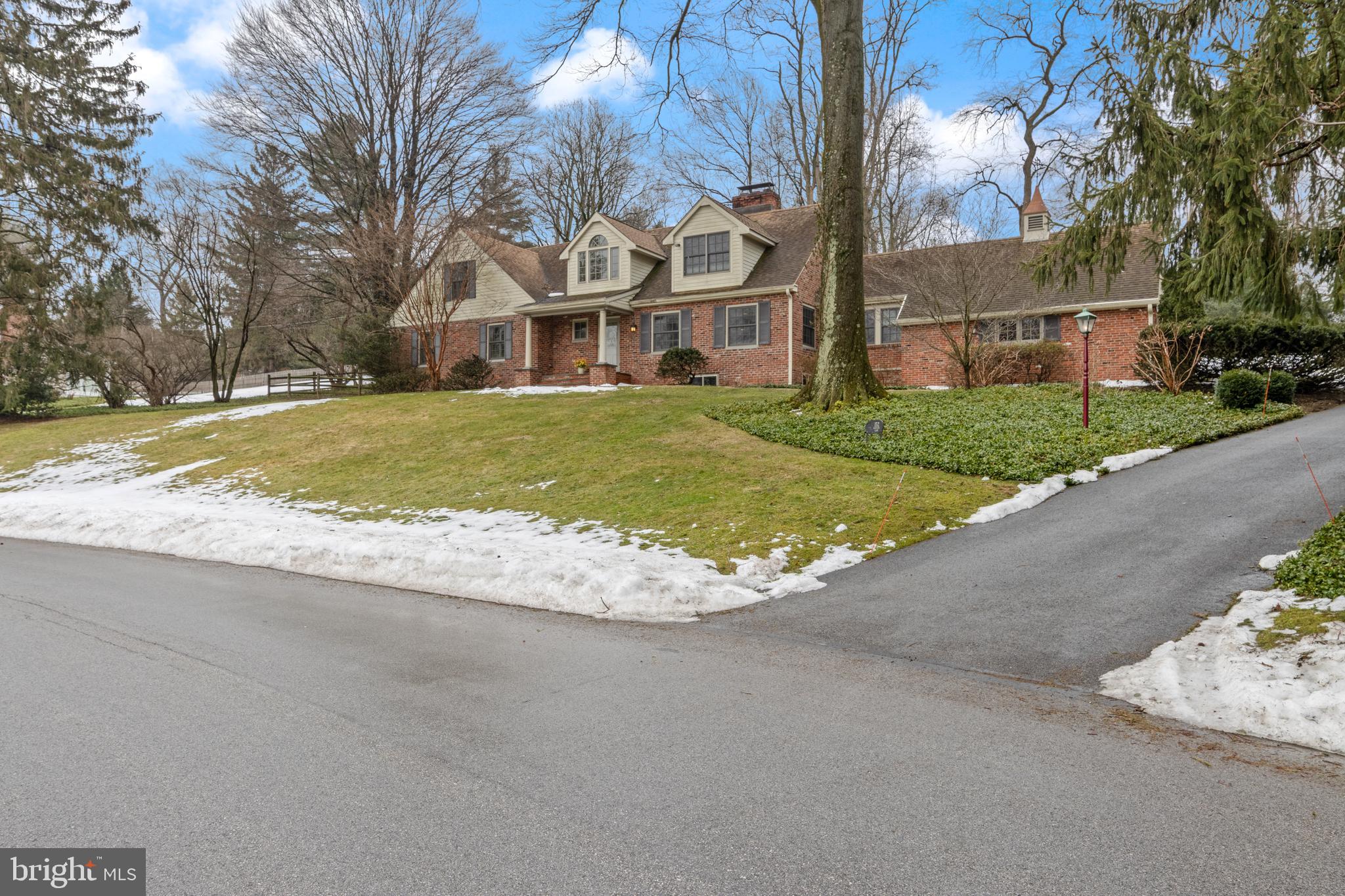 152 Hunters Lane Devon, PA 19333 - Photo 4 of 57 a view of a house with a yard and large tree