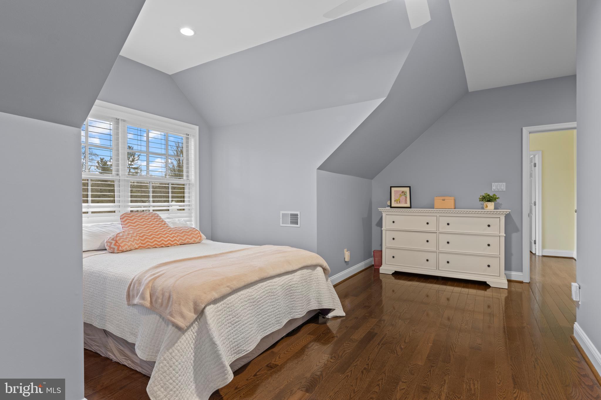 152 Hunters Lane Devon, PA 19333 - Photo 44 of 57 a bedroom with a bed and wooden floor