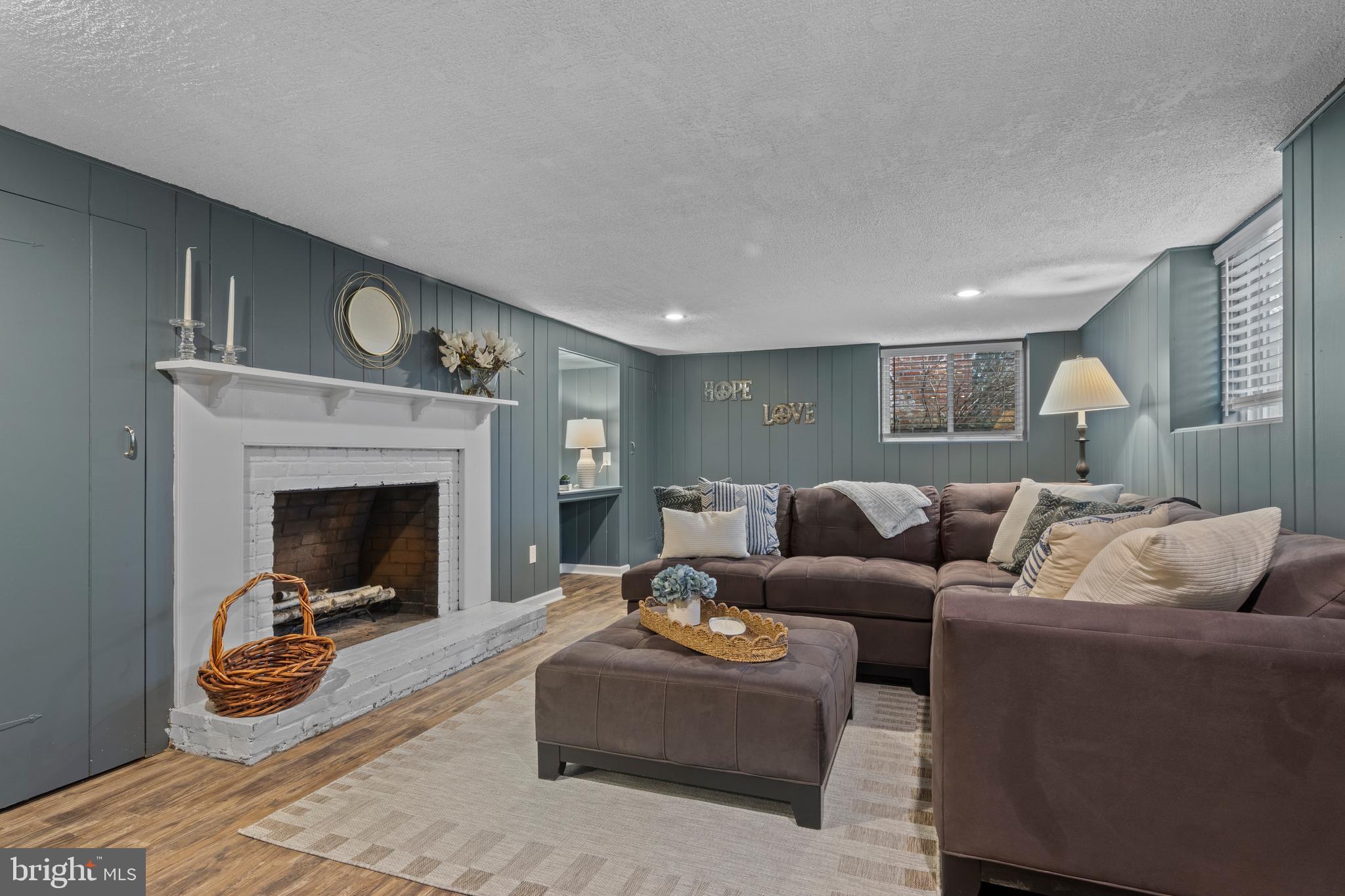 152 Hunters Lane Devon, PA 19333 - Photo 53 of 57 a living room with furniture and a fireplace