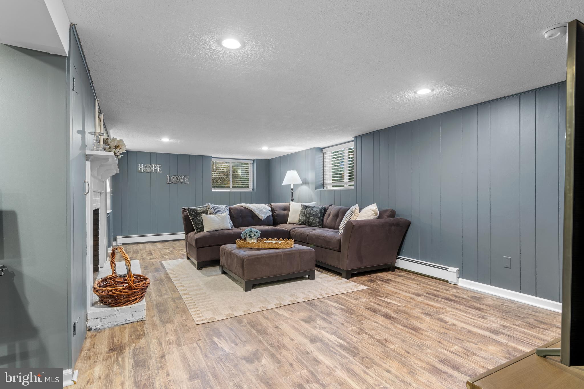 152 Hunters Lane Devon, PA 19333 - Photo 54 of 57 a living room with furniture and a wooden floor