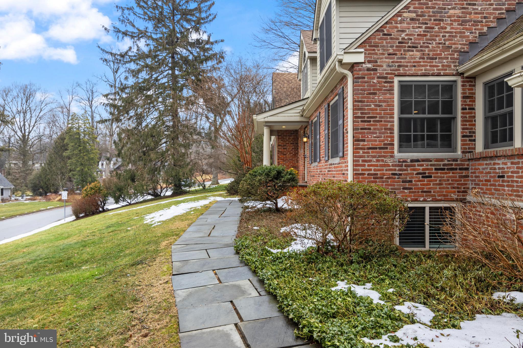 152 Hunters Lane Devon, PA 19333 - Photo 8 of 57 a front view of a house with a yard