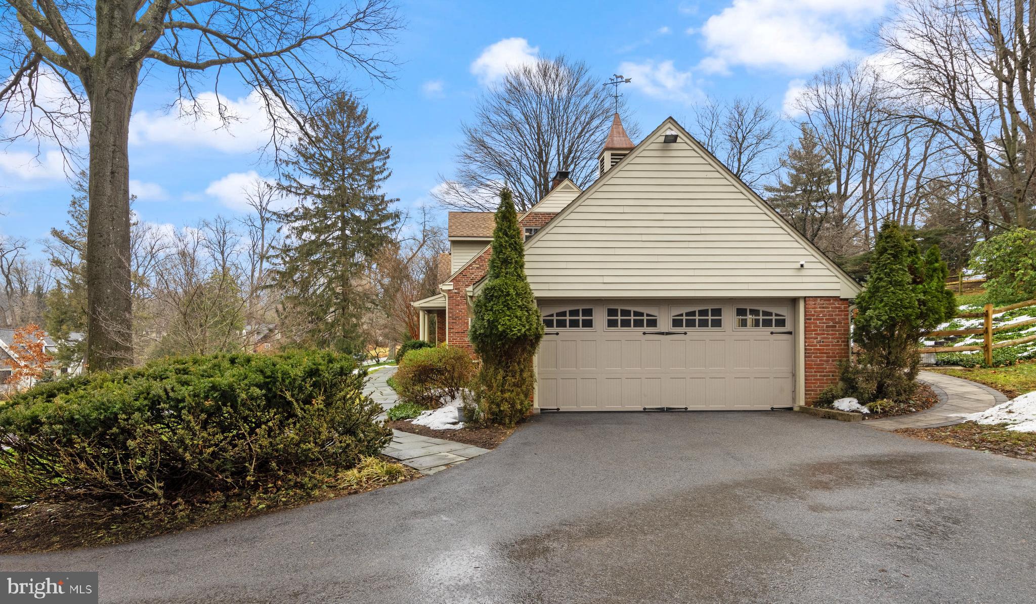 152 Hunters Lane Devon, PA 19333 - Photo 9 of 57 a view of a house with a yard and potted plants