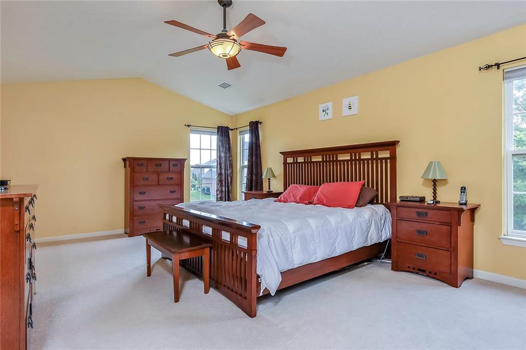 103 Teak Road Elizabeth, PA 15037 - Photo 14 of 19 The master bedroom, with vaulted ceilings and plenty of light, has space for various furniture arrangements.