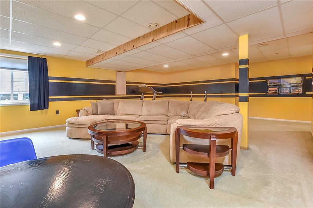 103 Teak Road Elizabeth, PA 15037 - Photo 18 of 19 With all of this space you can have all of your friends- and their friends- over to watch the game!