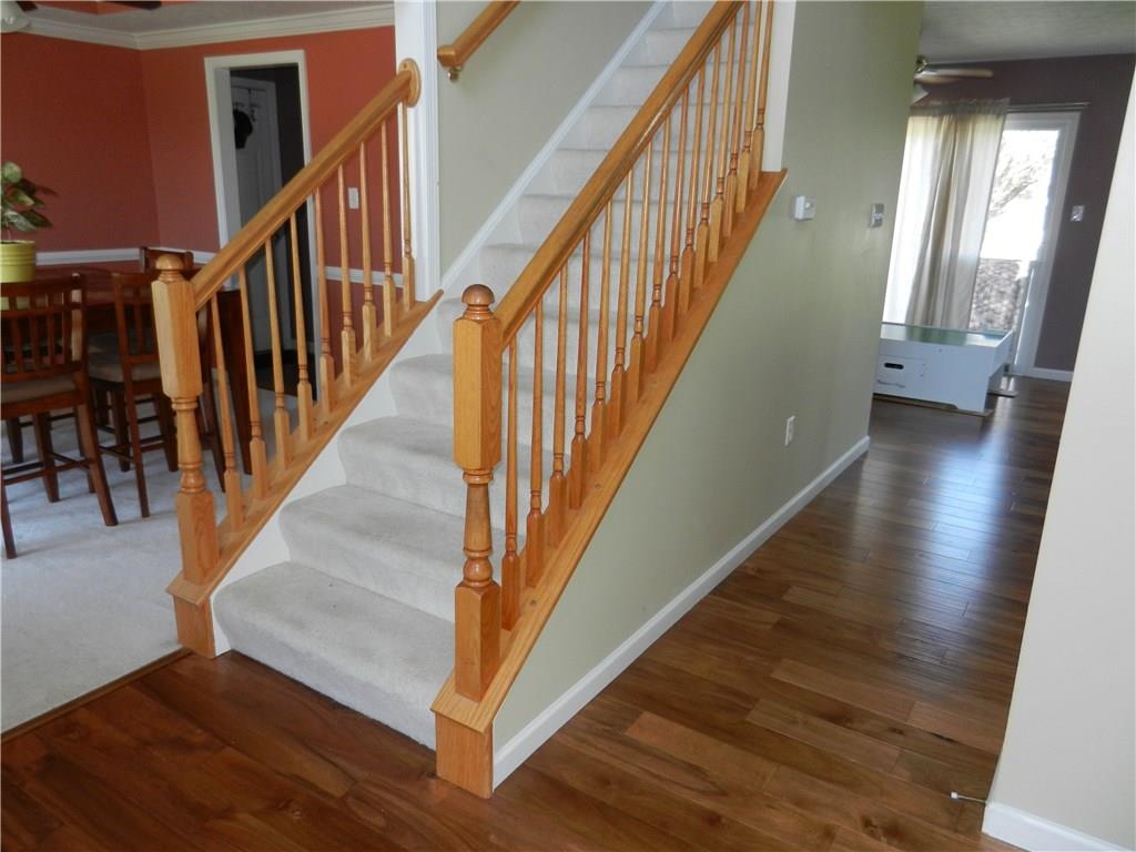 103 Teak Road Elizabeth, PA 15037 - Photo 6 of 19 Gleaming new flooring, 2 story ceiling and lots of natural light in the entry.