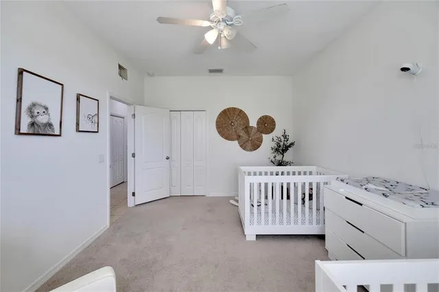 a view of a lake with a building in the background