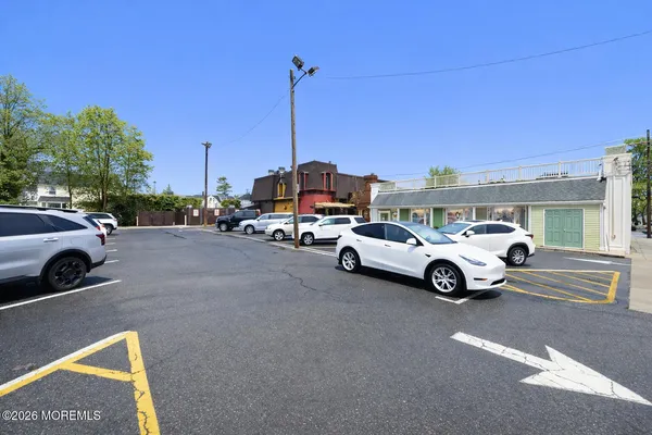 a view of parking space with parked cars