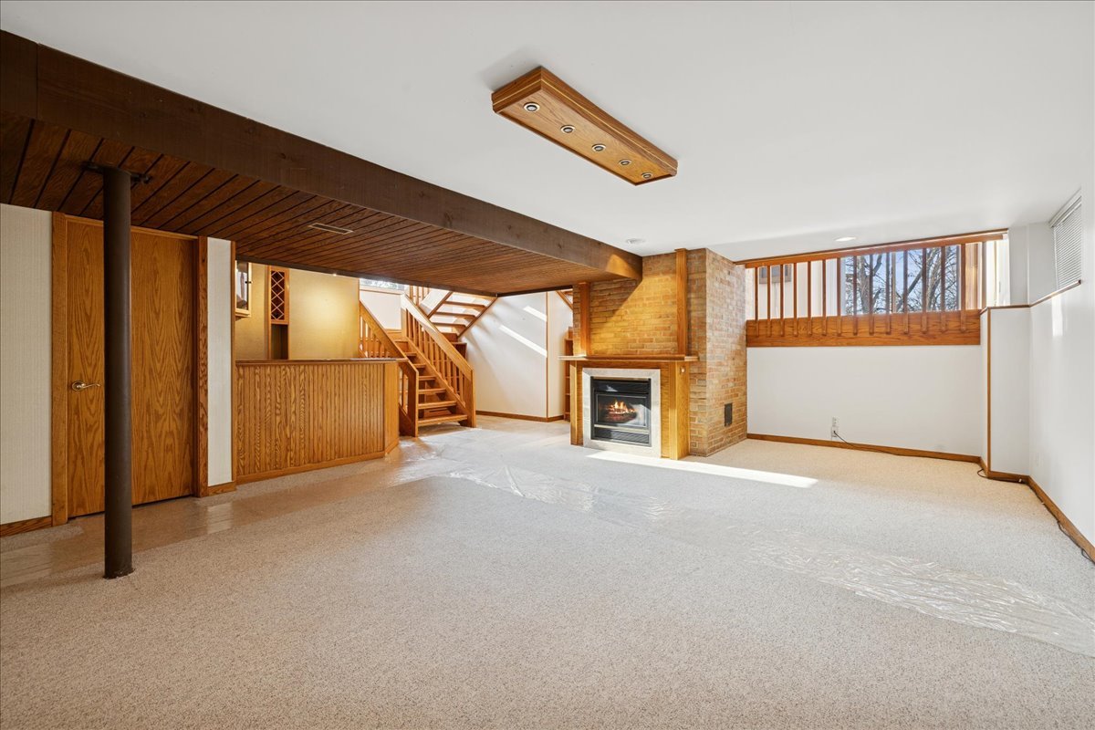 43W880 Pathfinder Drive Maple Park, IL 60151 - Photo 26 of 38 a view of an empty room with a fireplace