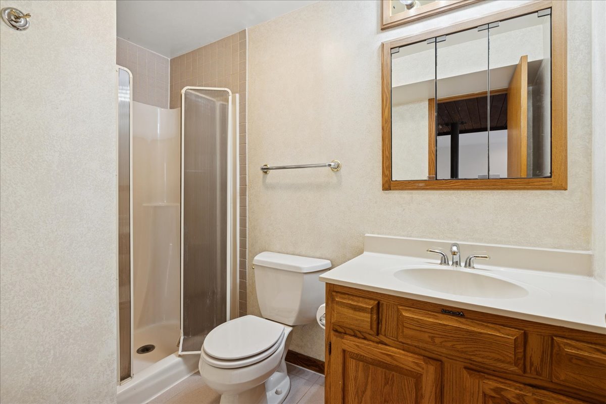 43W880 Pathfinder Drive Maple Park, IL 60151 - Photo 27 of 38 a bathroom with a sink a toilet and shower
