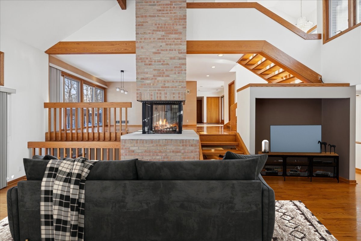 43W880 Pathfinder Drive Maple Park, IL 60151 - Photo 4 of 38 a living room with furniture and a fireplace