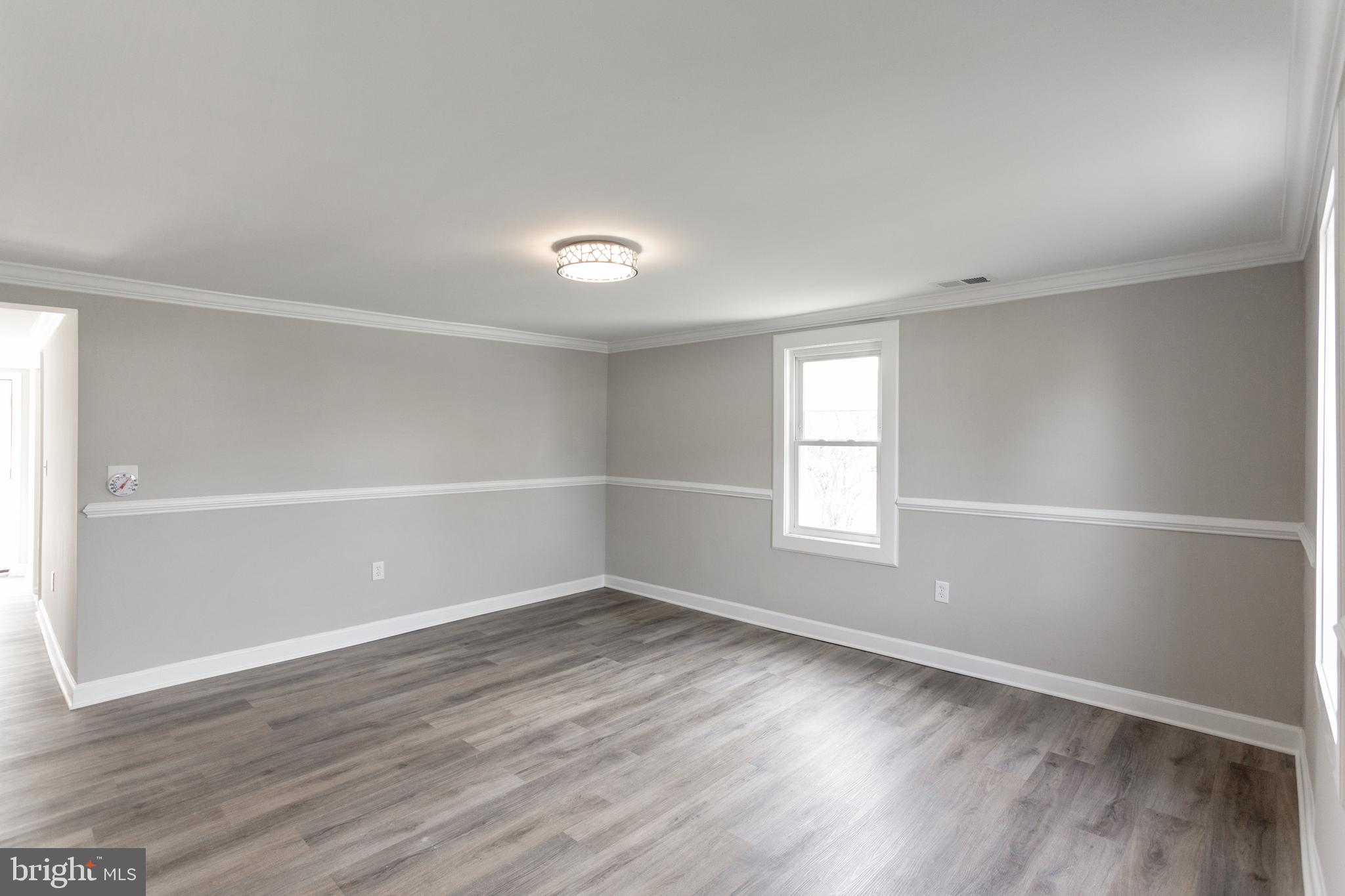 2087 Park Trail Road Windsor Mill, MD 21244 - Photo 13 of 32 Living Room - New Windows and light fixtures