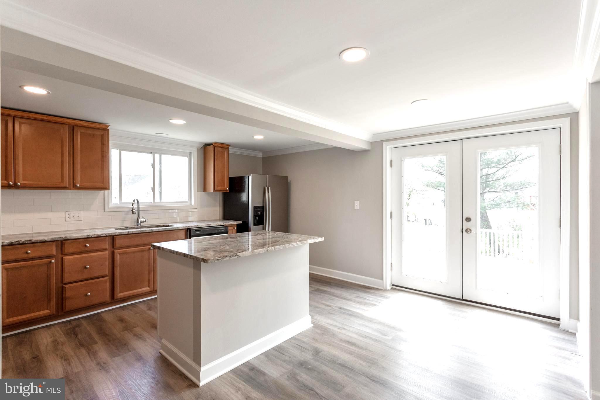 2087 Park Trail Road Windsor Mill, MD 21244 - Photo 2 of 32 Large Open kitchen - French Doors to porch deck