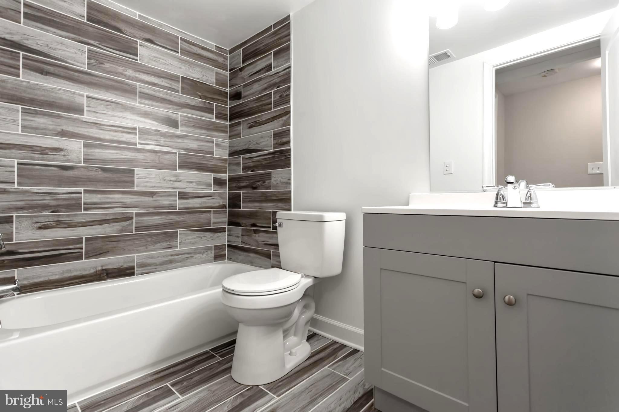 2087 Park Trail Road Windsor Mill, MD 21244 - Photo 22 of 32 New! tub, toilet, vanity, fixtures, tile