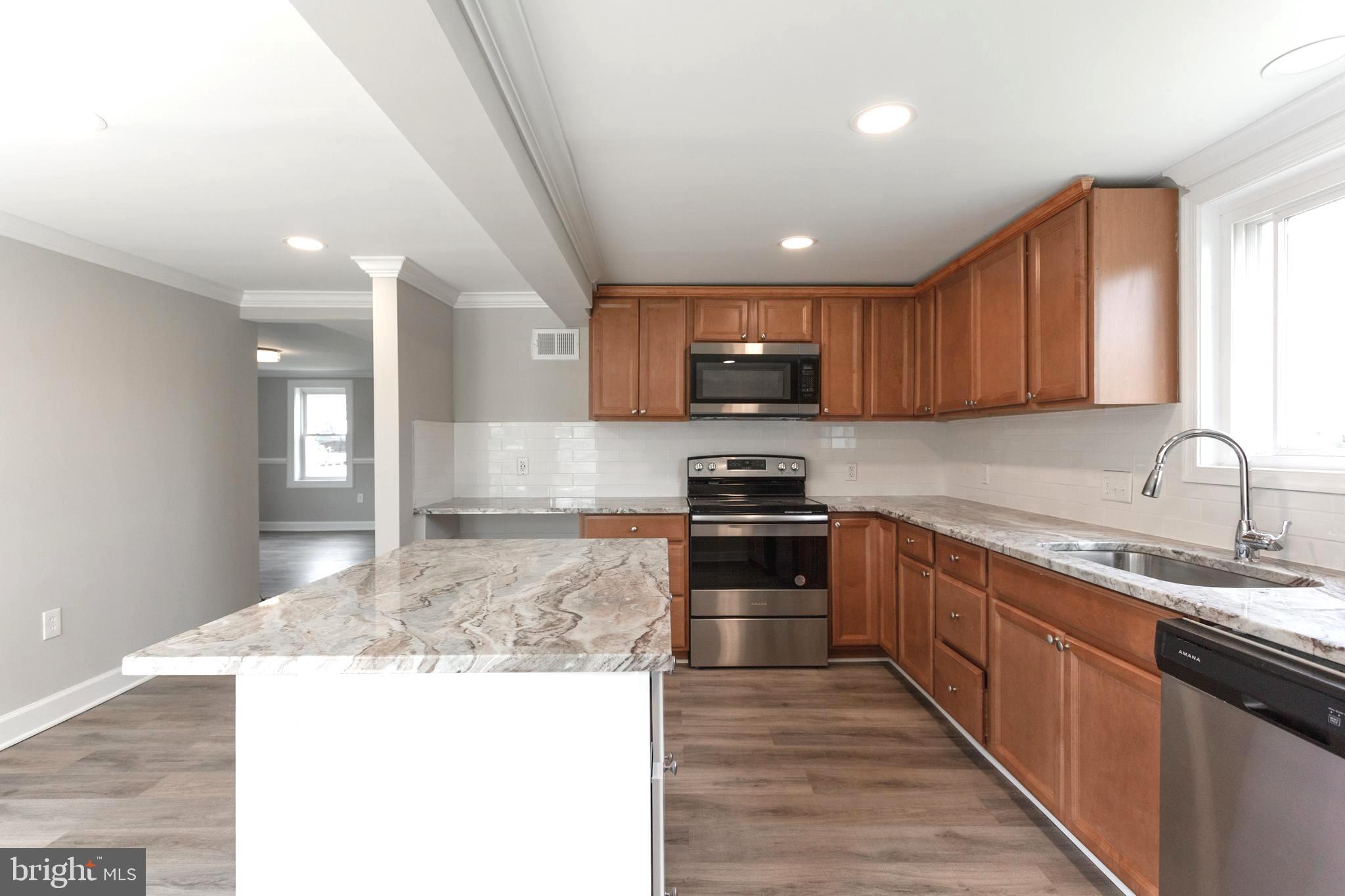 2087 Park Trail Road Windsor Mill, MD 21244 - Photo 4 of 32 Granite counters and soft close cabinets/ drawers
