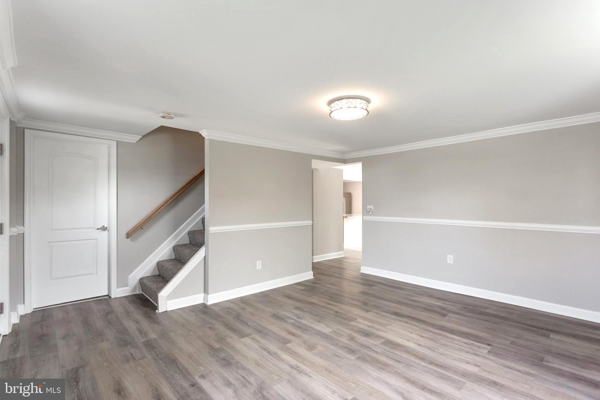 2087 Park Trail Road Windsor Mill, MD 21244 - Photo 7 of 32 Living Room - Luxury Vinyl Plank Flooring