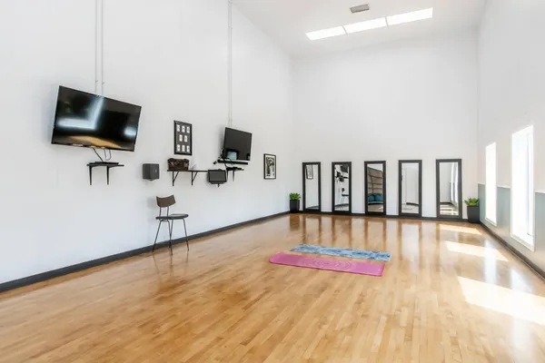 a view of a swimming pool with a lounge chairs