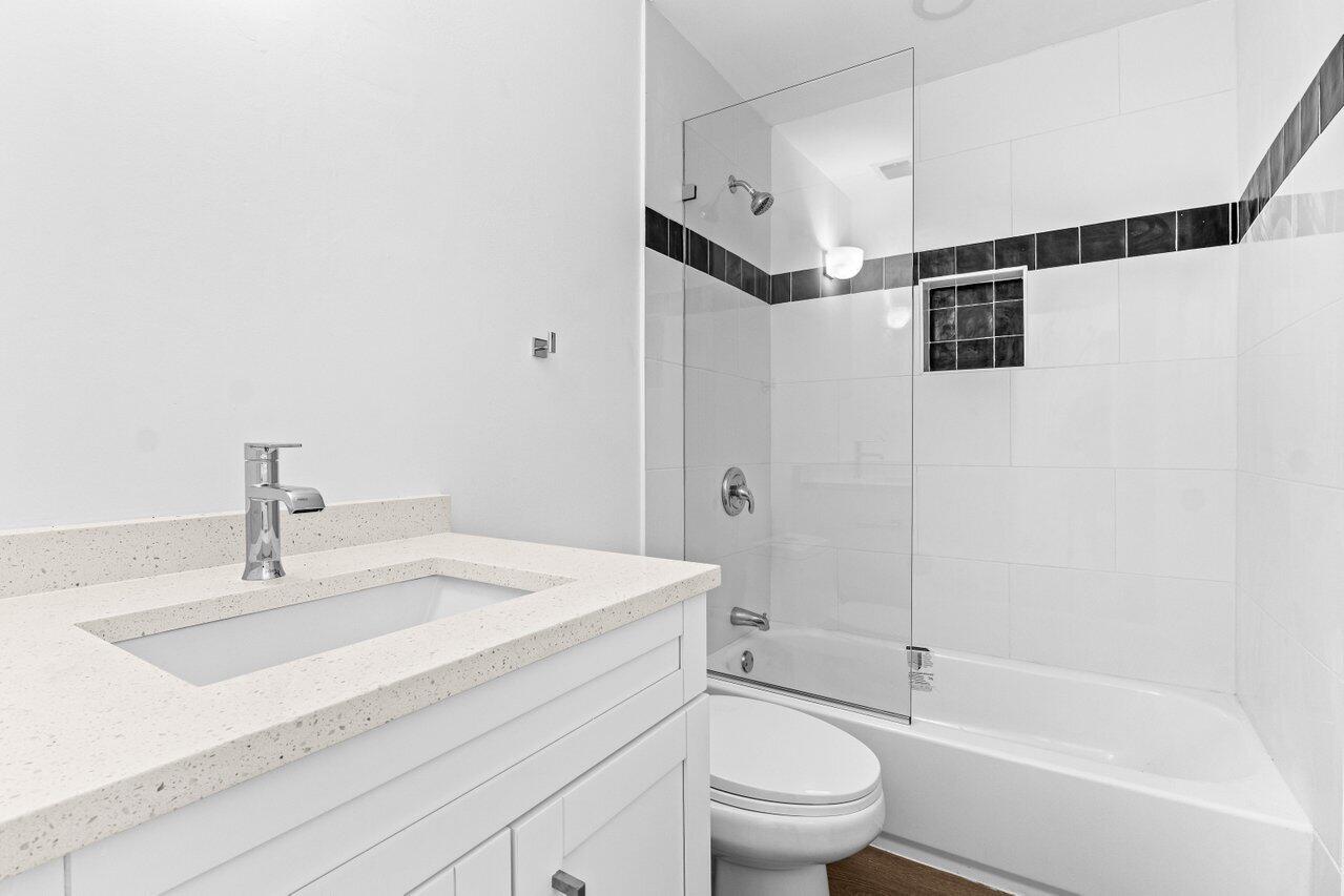 13105 Belhaven Court, Unit 15 Wellington, FL 33414 - Photo 11 of 27 Guest bathroom