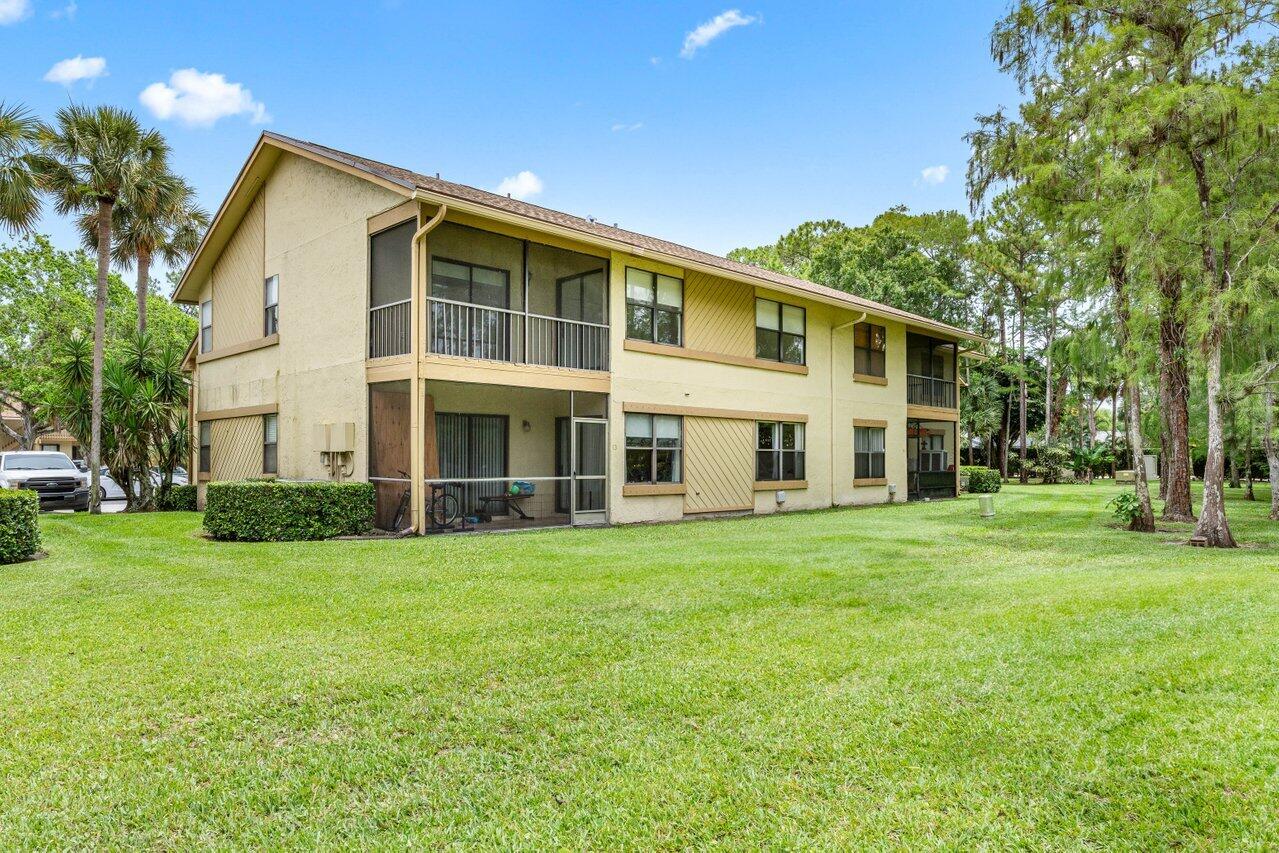 13105 Belhaven Court, Unit 15 Wellington, FL 33414 - Photo 13 of 27 Back view
