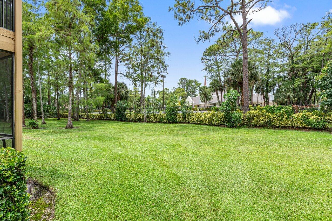 13105 Belhaven Court, Unit 15 Wellington, FL 33414 - Photo 14 of 27 Back yard view