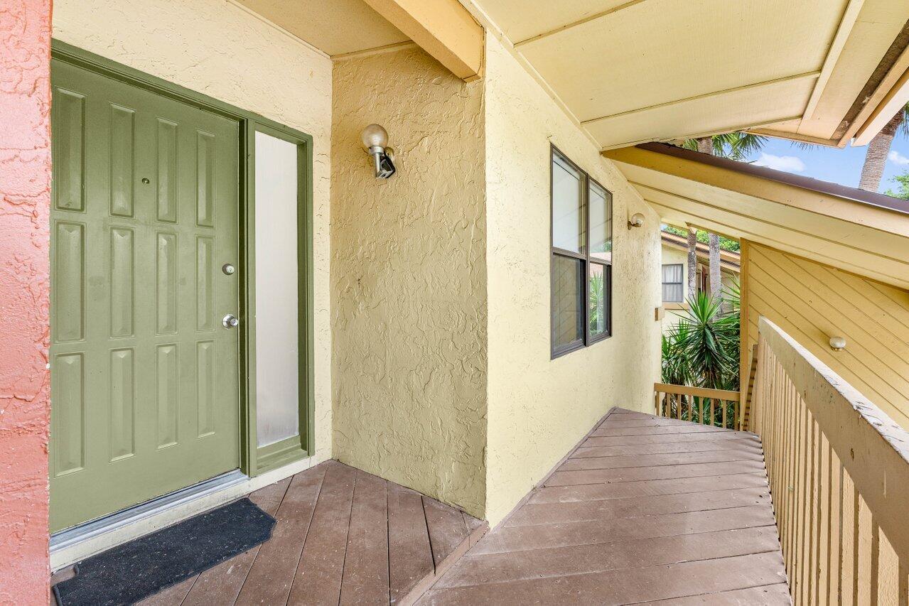 13105 Belhaven Court, Unit 15 Wellington, FL 33414 - Photo 16 of 27 Front entrance view