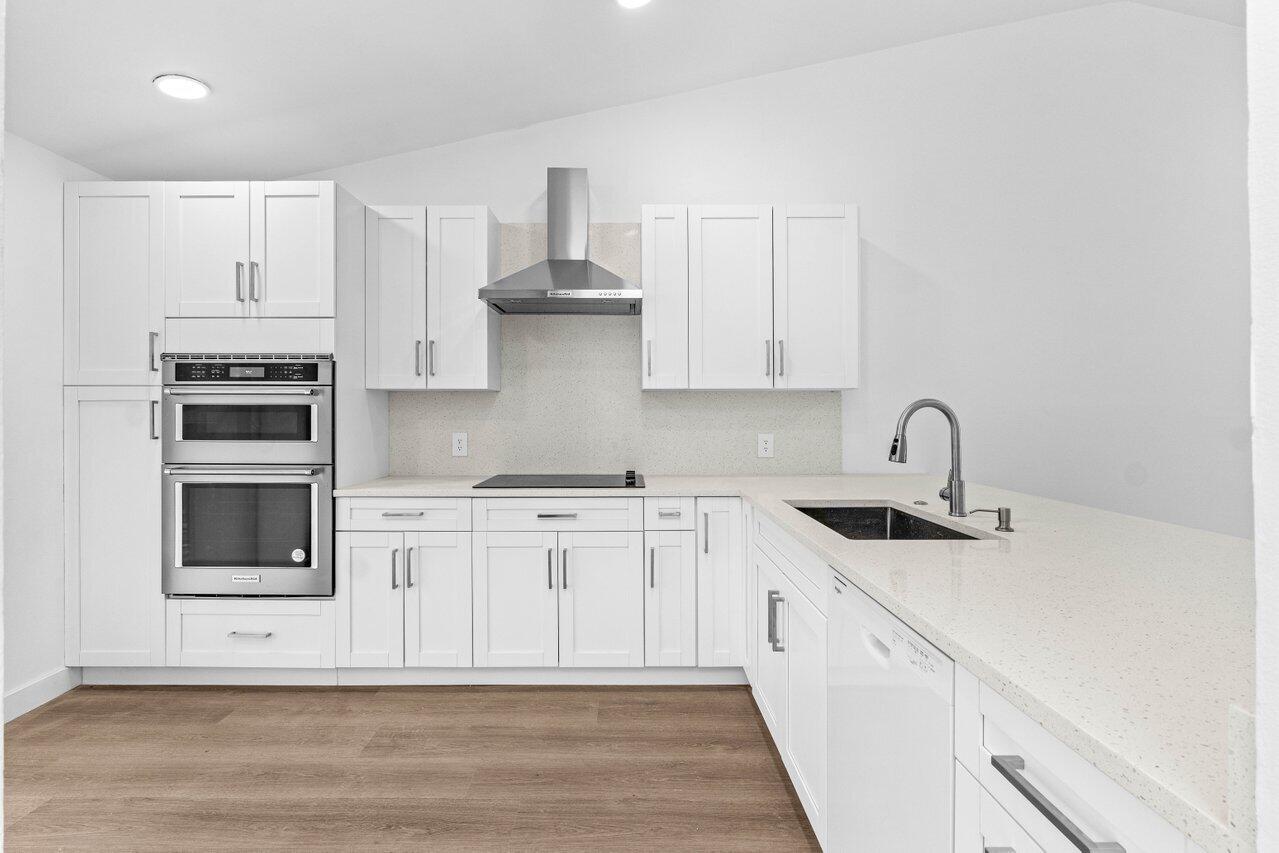 13105 Belhaven Court, Unit 15 Wellington, FL 33414 - Photo 18 of 27 Kitchen view