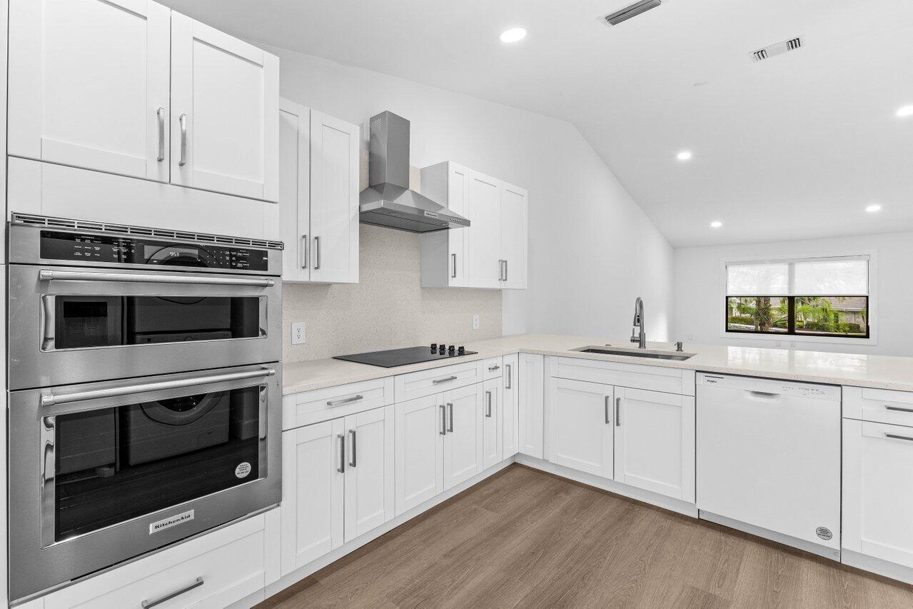 13105 Belhaven Court, Unit 15 Wellington, FL 33414 - Photo 2 of 27 Kitchen view