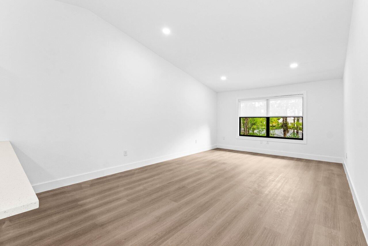 13105 Belhaven Court, Unit 15 Wellington, FL 33414 - Photo 3 of 27 Dining and Living area