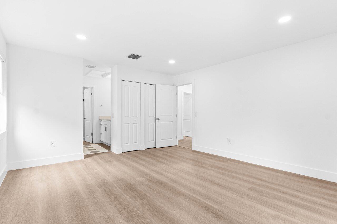 13105 Belhaven Court, Unit 15 Wellington, FL 33414 - Photo 8 of 27 Master bedroom