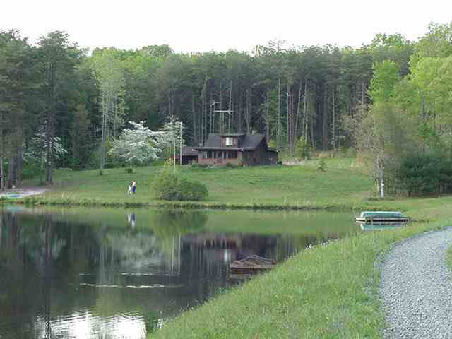 Cold Spring Trail, Unit RT1BOX3170 Palmyra, VA 22963 - Photo 1 of 4 a view of a lake view with a garden