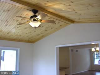 94 Harvard Road Pennsville, NJ 08070 - Photo 4 of 6 a light fixture a kitchen and a window