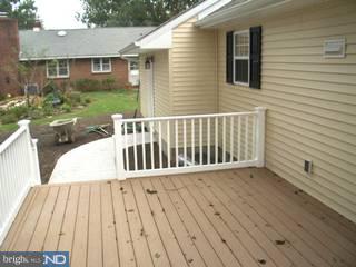 94 Harvard Road Pennsville, NJ 08070 - Photo 6 of 6 a view of a wooden deck