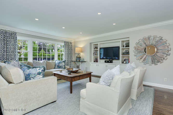 110 Meadow Road Riverside, CT 06878 - Photo 16 of 38 a living room with furniture and a flat screen tv