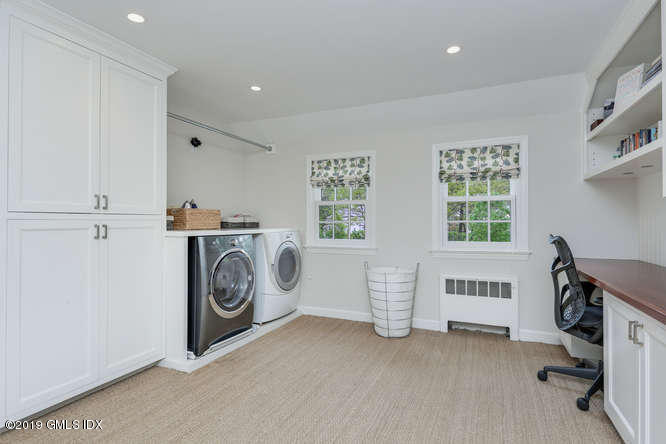 110 Meadow Road Riverside, CT 06878 - Photo 27 of 38 a view of a storage & utility room with washer and dryer
