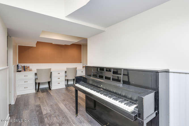 110 Meadow Road Riverside, CT 06878 - Photo 30 of 38 walk in closet with wooden floor