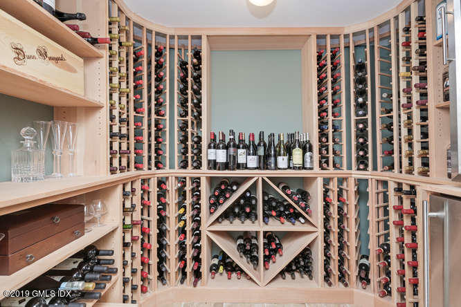 110 Meadow Road Riverside, CT 06878 - Photo 31 of 38 a view of an chairs and table in a balcony