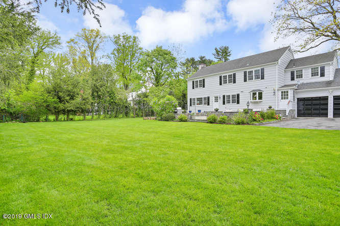 110 Meadow Road Riverside, CT 06878 - Photo 34 of 38 a view of house with yard and green space