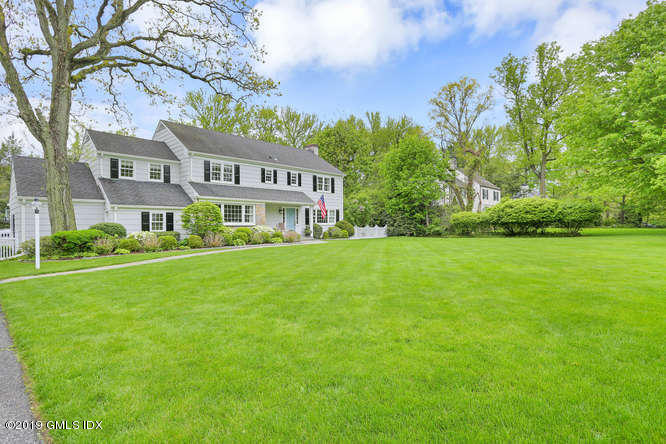110 Meadow Road Riverside, CT 06878 - Photo 35 of 38 a view of a house with a big yard