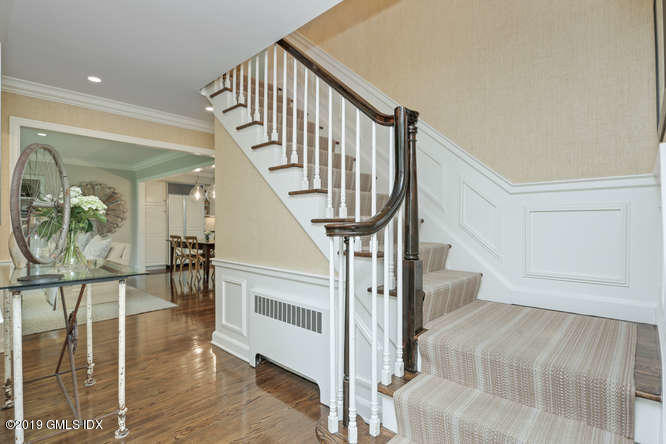 110 Meadow Road Riverside, CT 06878 - Photo 4 of 38 a view of entryway and hall with wooden floor