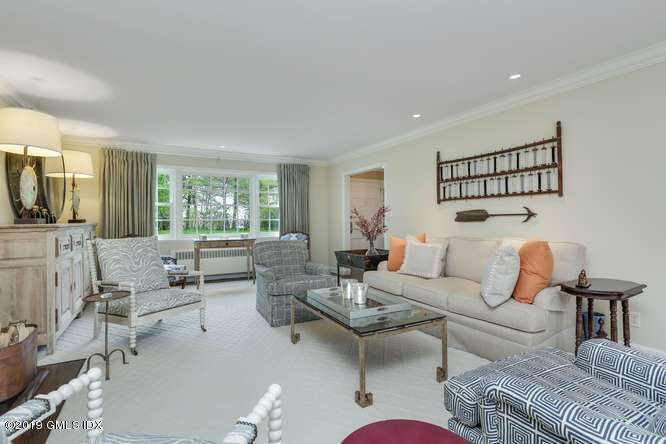 110 Meadow Road Riverside, CT 06878 - Photo 5 of 38 a living room with furniture and a large window