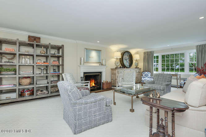 110 Meadow Road Riverside, CT 06878 - Photo 6 of 38 a living room with furniture and a fireplace